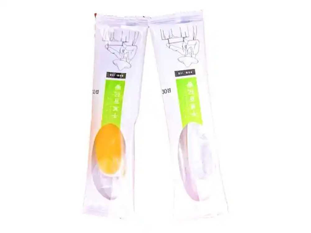 吕工机械全自动勺子灌装封口机——解决蜂蜜、膏方、秋梨膏等高黏物料包装难题