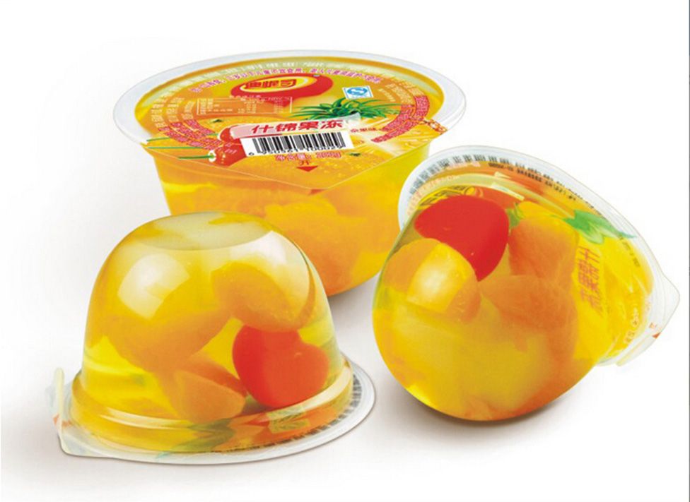 全自动果冻灌装封口机：重塑杯装果冻智造效率新标杆